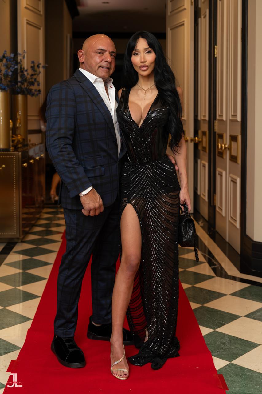 Couple arriving on the red carpet at a Toronto charity gala